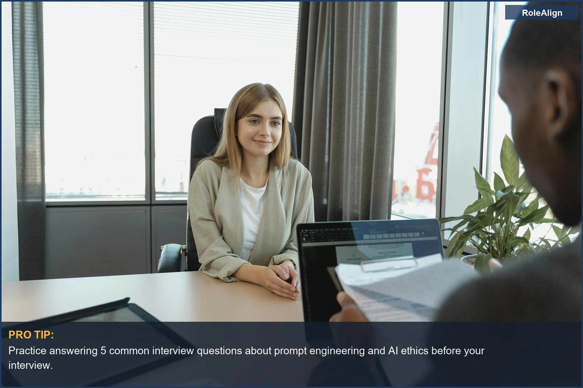 Young woman confidently interviews for a prompt engineer job in a modern office setting.