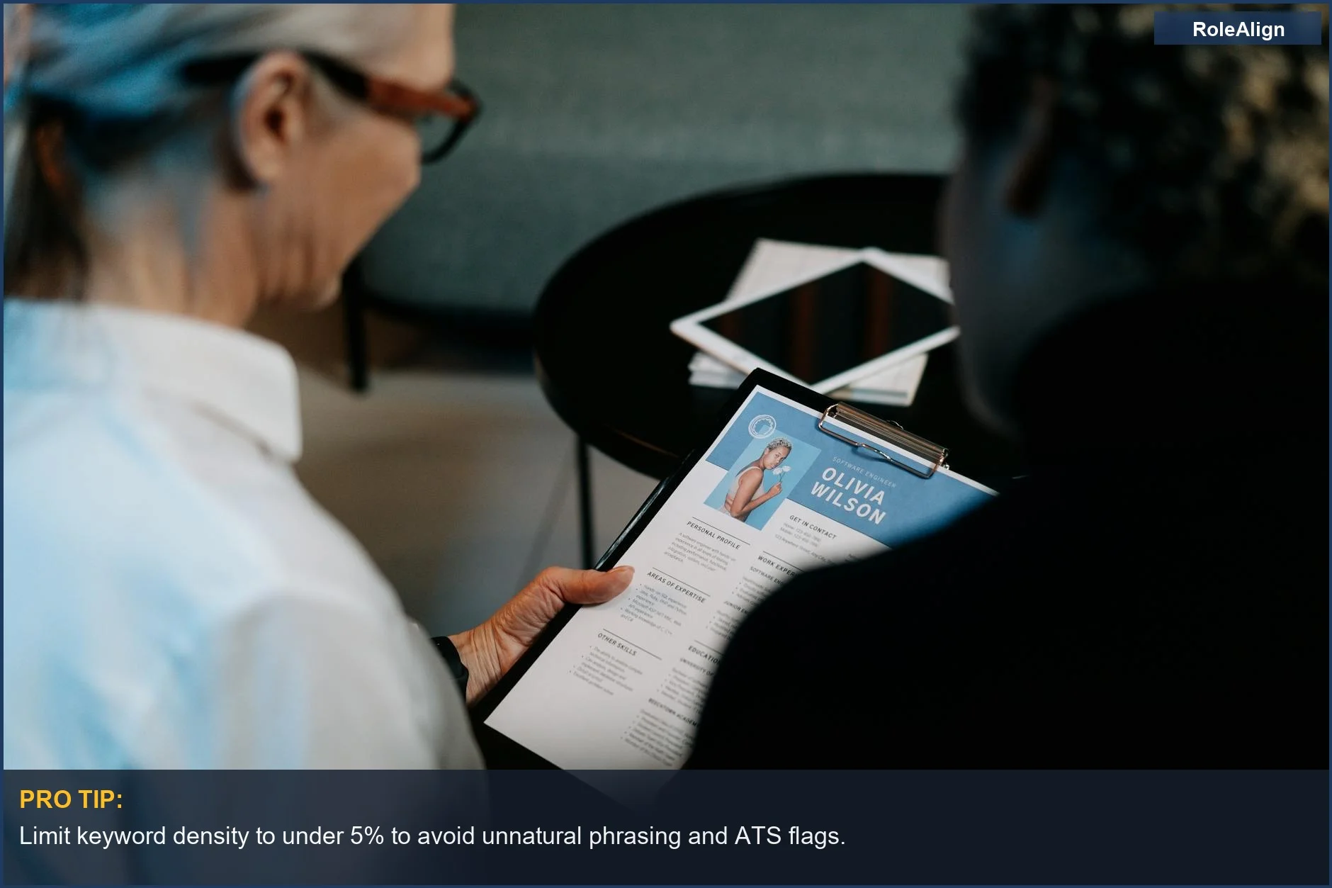 Interviewers review resume, demonstrating keyword stuffing trap and ATS tools problems.