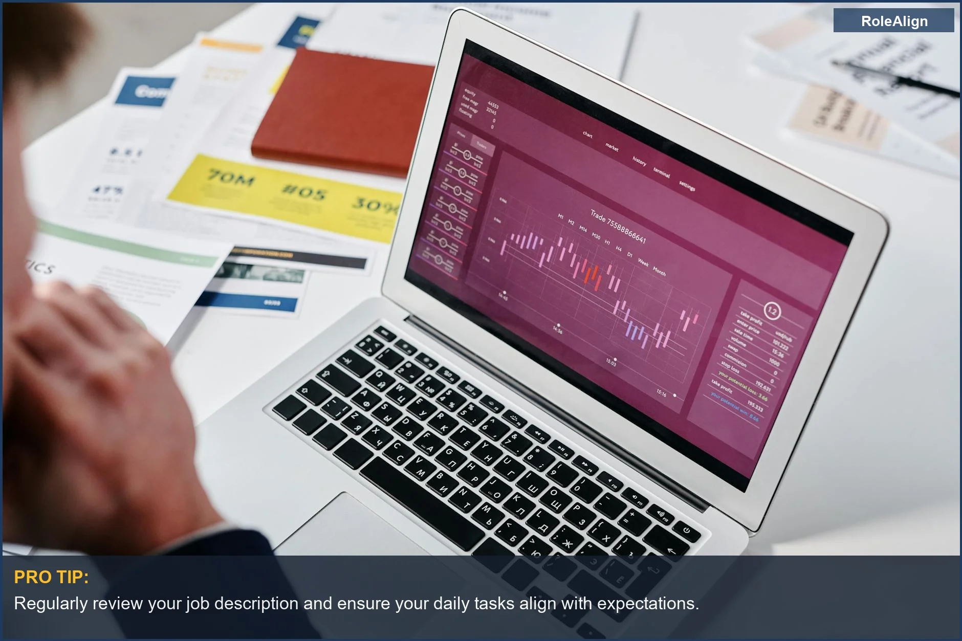 Businessperson reviewing data analytics on a laptop, preparing for potential dismissal during probation.