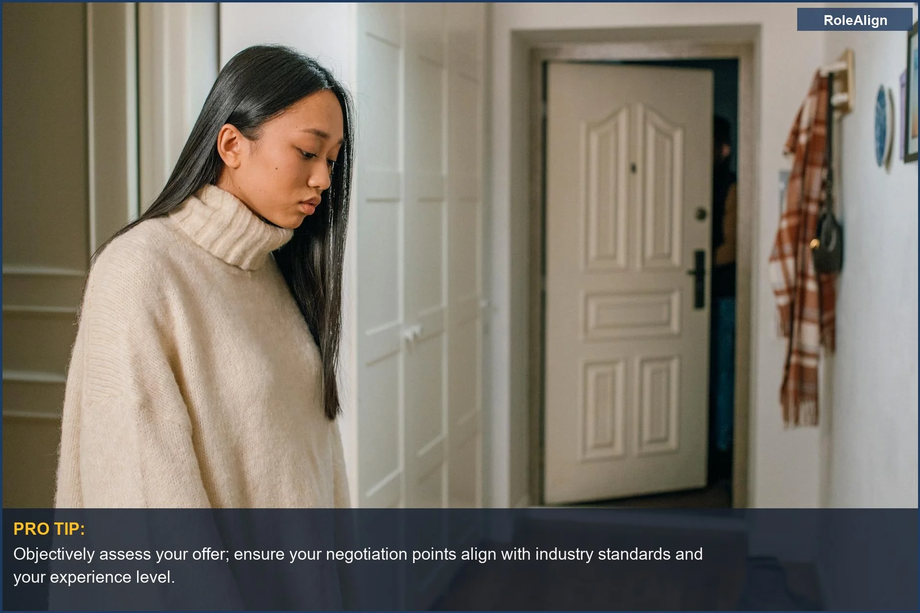 Pensive woman looking down, considering the objective assessment of an offer before negotiation.