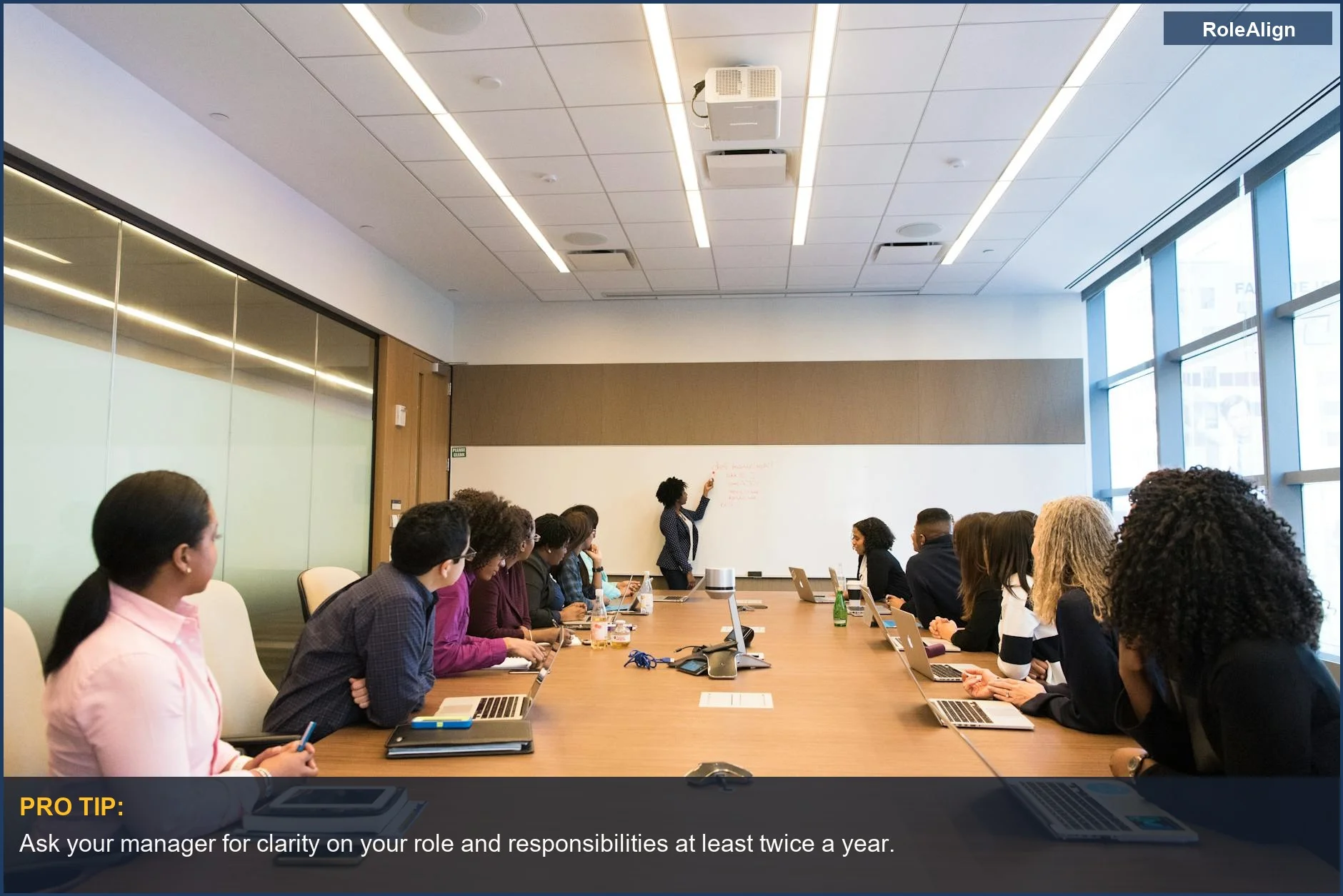 Diverse team collaborates in a modern conference room for manager meetings about employees.