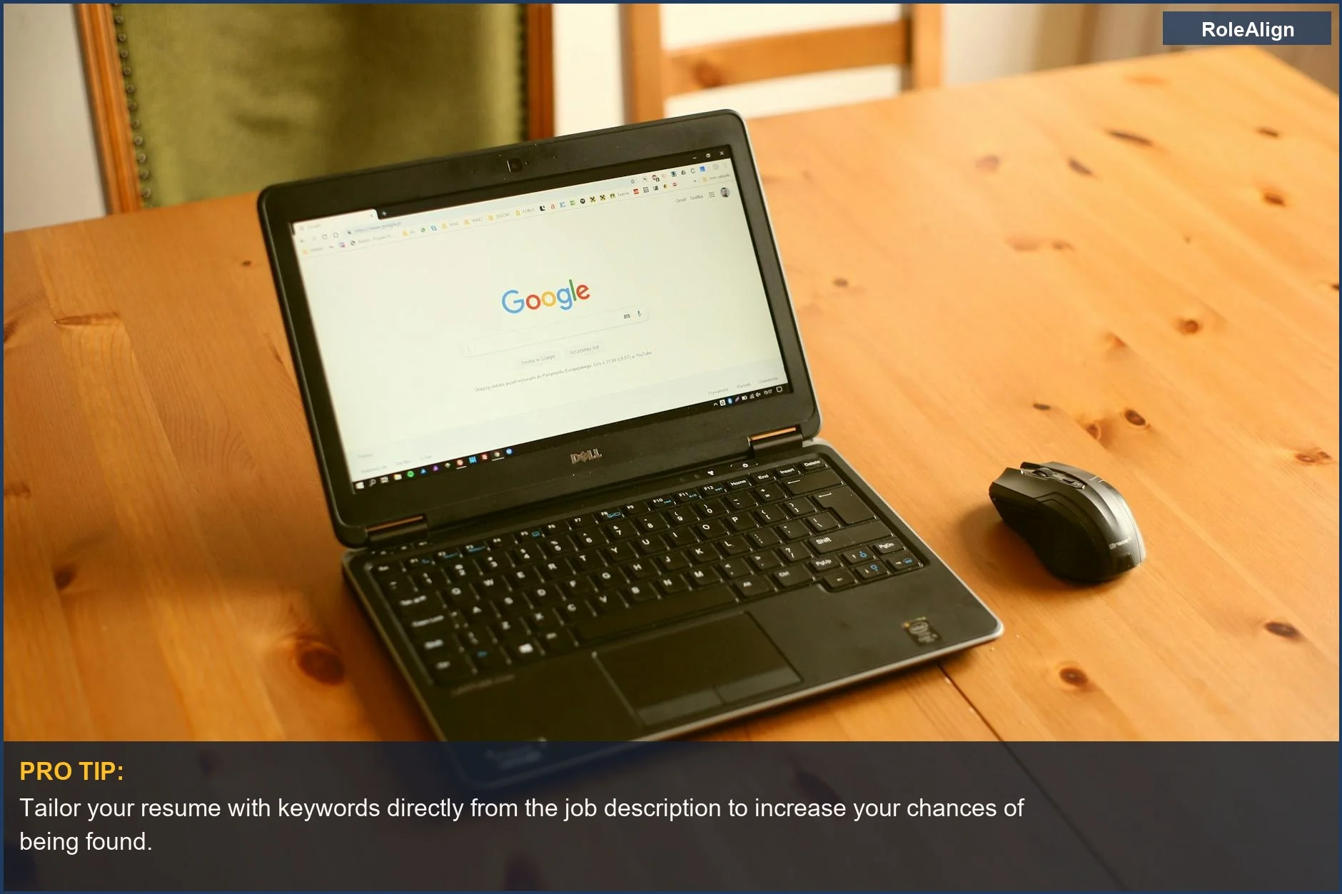 Laptop with Google homepage open on a wooden desk, mirroring recruiter ATS search methods.