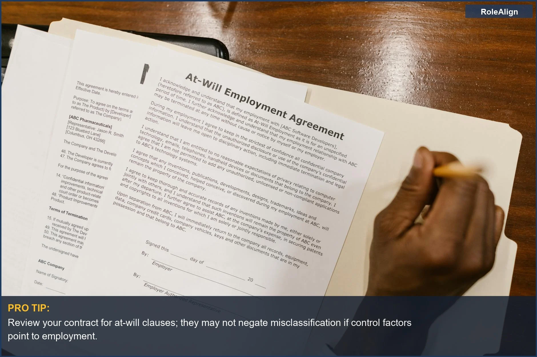Worker signs at-will agreement, highlighting employee vs contractor distinctions and legal protections.