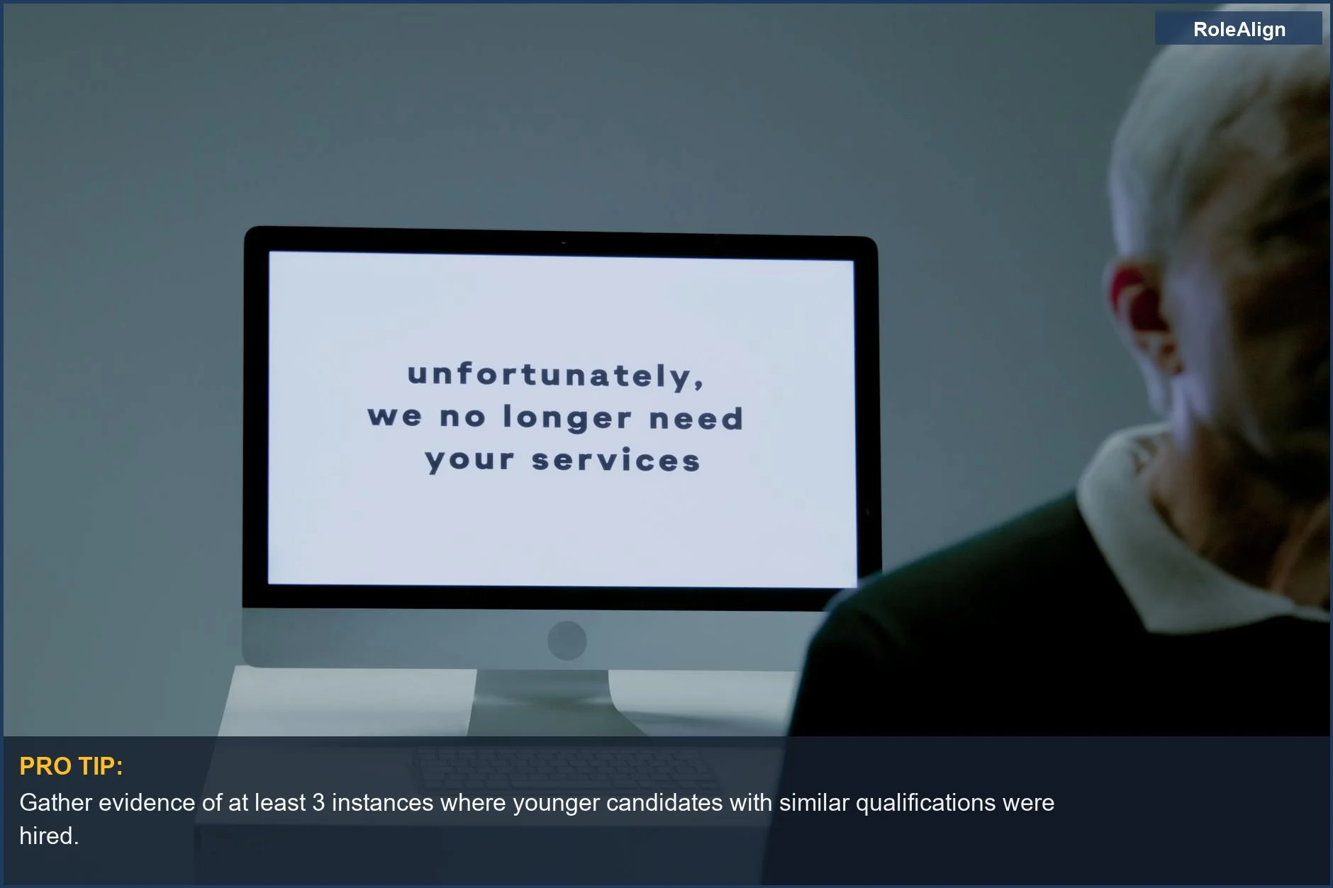 Computer screen displays job rejection message, highlighting potential age discrimination in hiring.