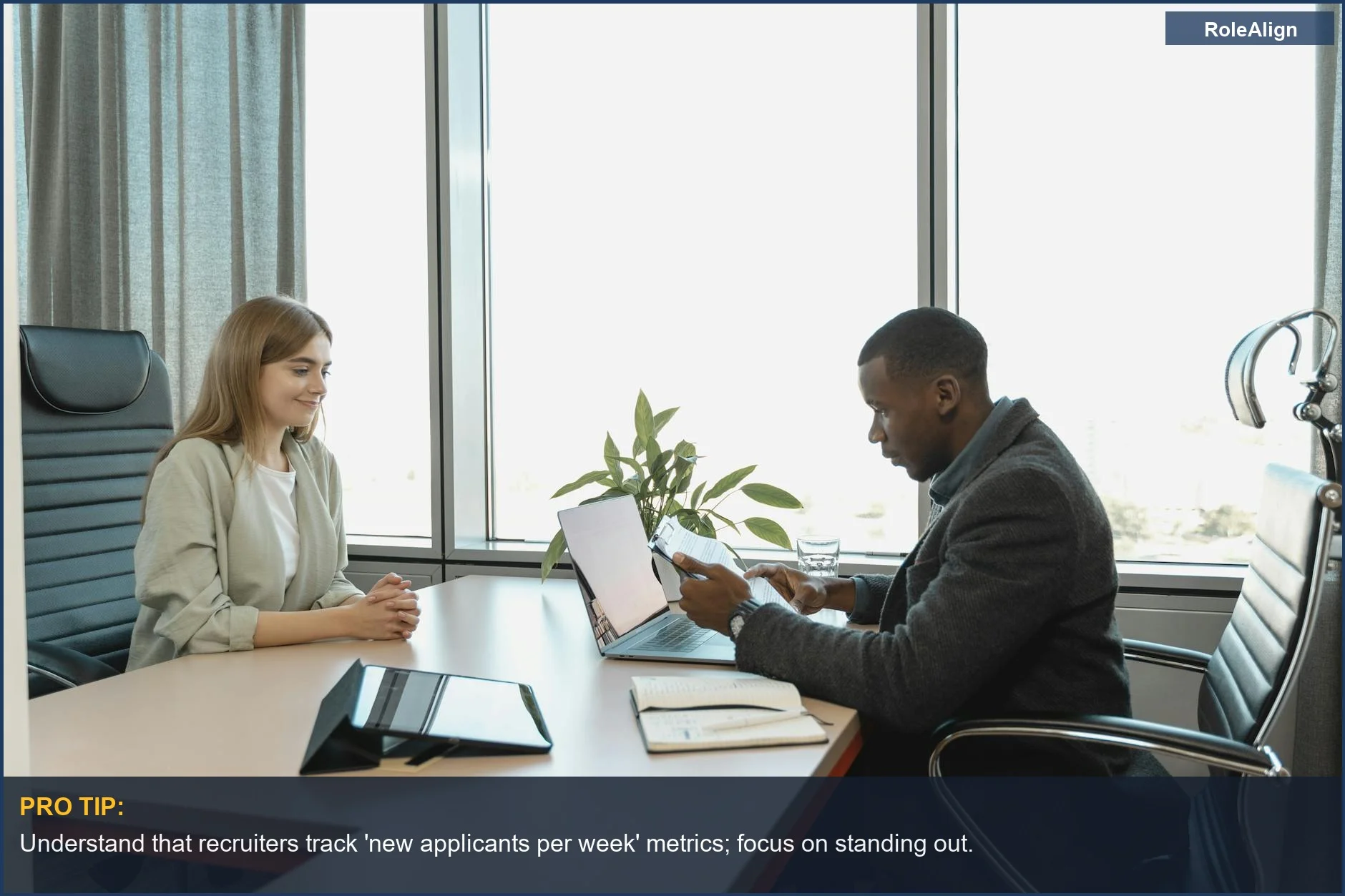 Diverse business meeting discussing job opportunities, illustrating team collaboration.