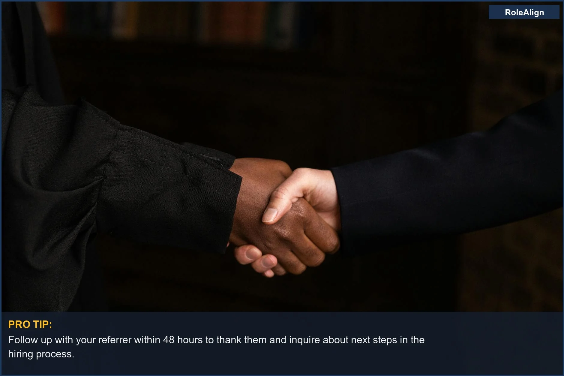 Close-up of diverse hands shaking, symbolizing a strong business agreement and successful candidate referral.