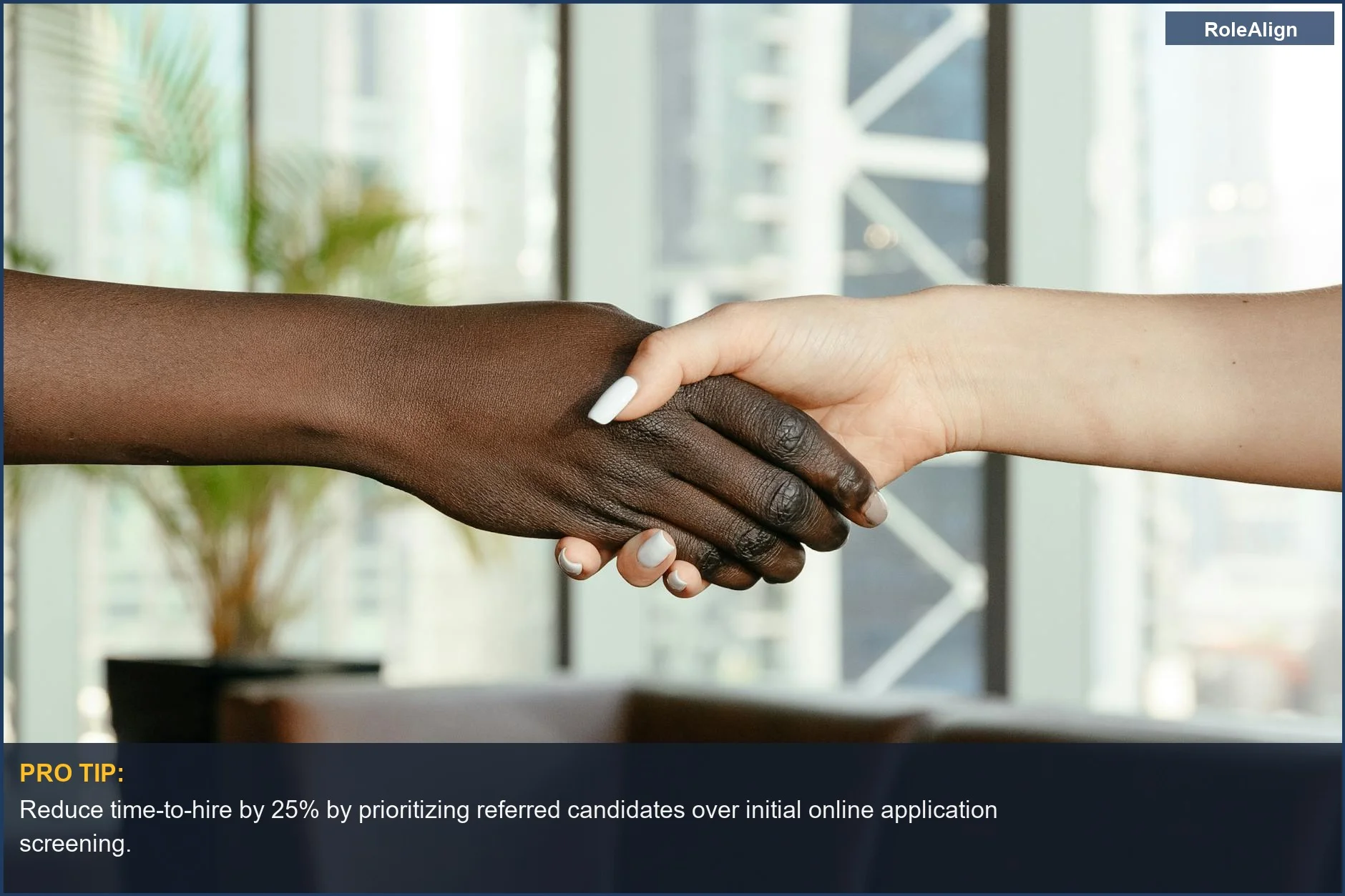 Diverse women in an office shaking hands, illustrating how job referral vs online application saves time.