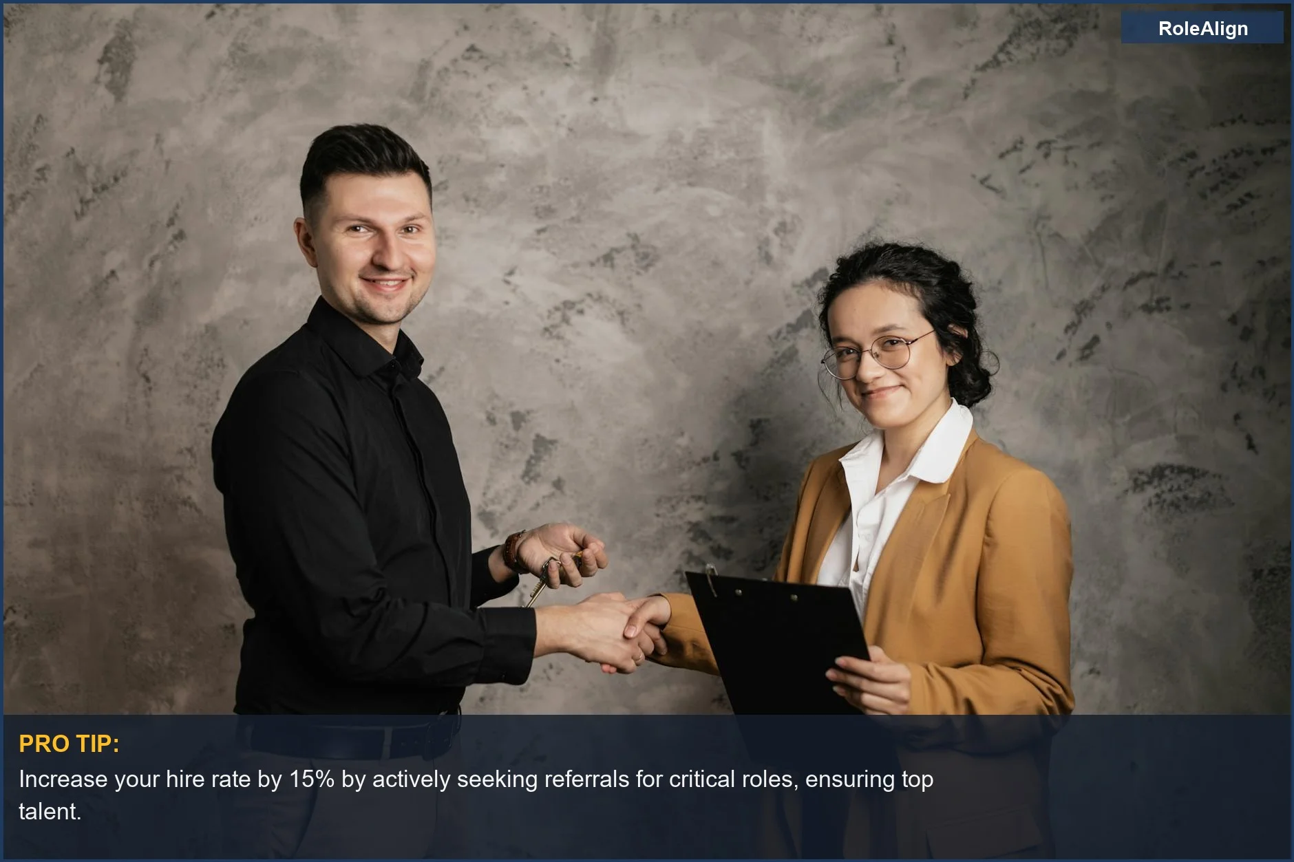Man and woman confidently shaking hands, highlighting the strong connections made through job referrals.