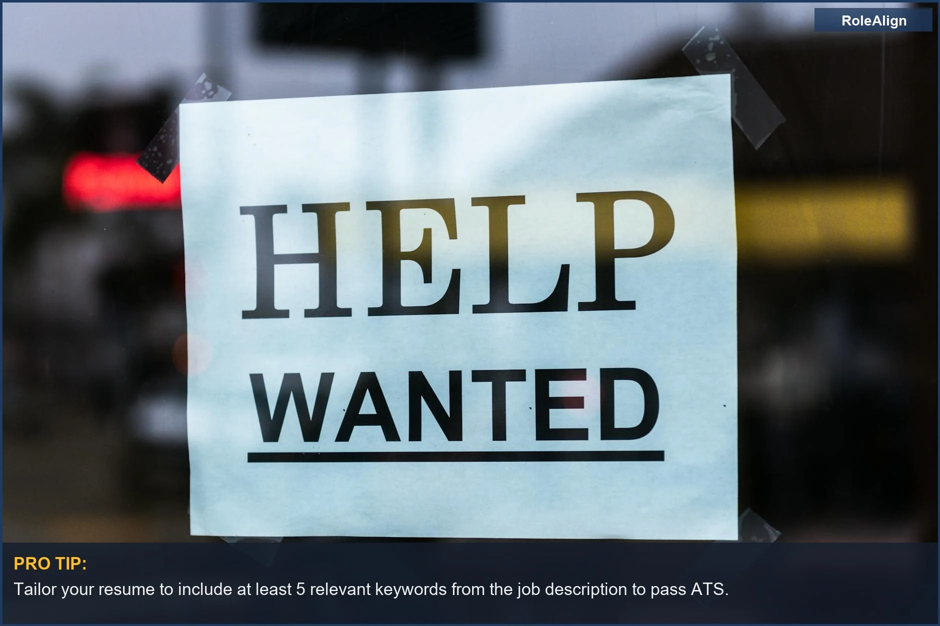 Close-up of a 'Help Wanted' sign on a store window, symbolizing the competitive job market and 'entry level 5 years' job requirements.
