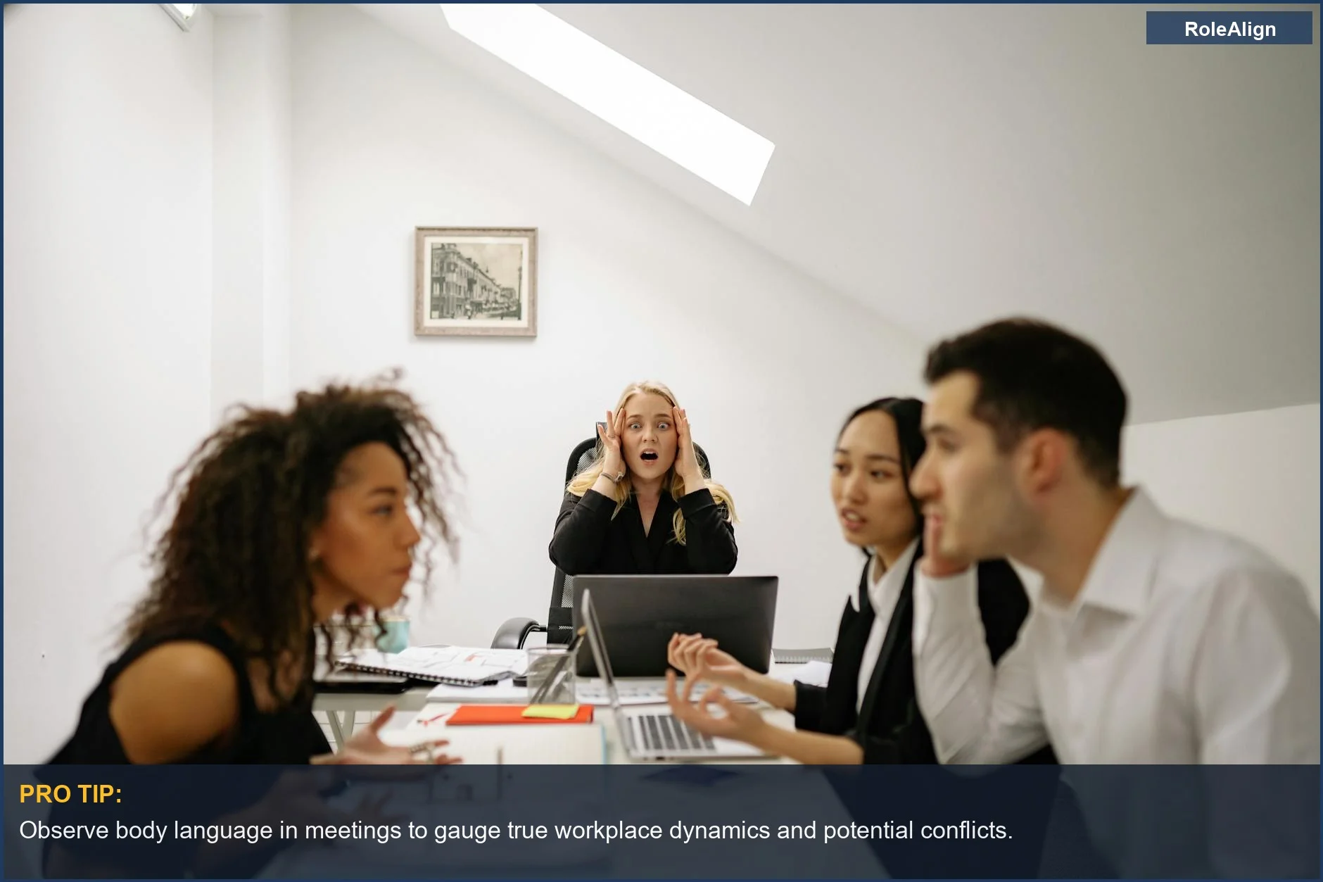 Diverse coworkers in a tense meeting, illustrating the human resources truth about company loyalty.