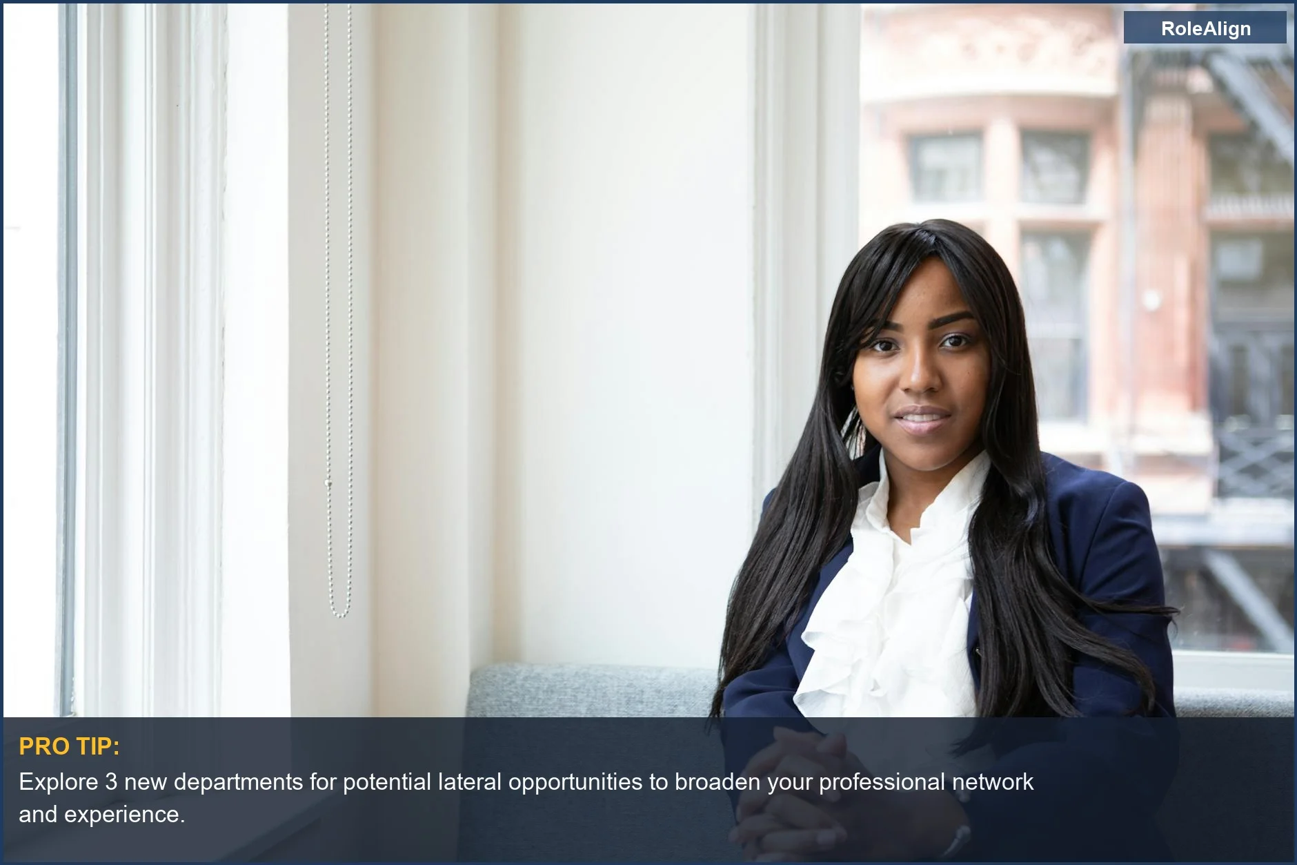 Confident businesswoman overlooking city from office window, symbolizing strategic career advancement through a lateral move.