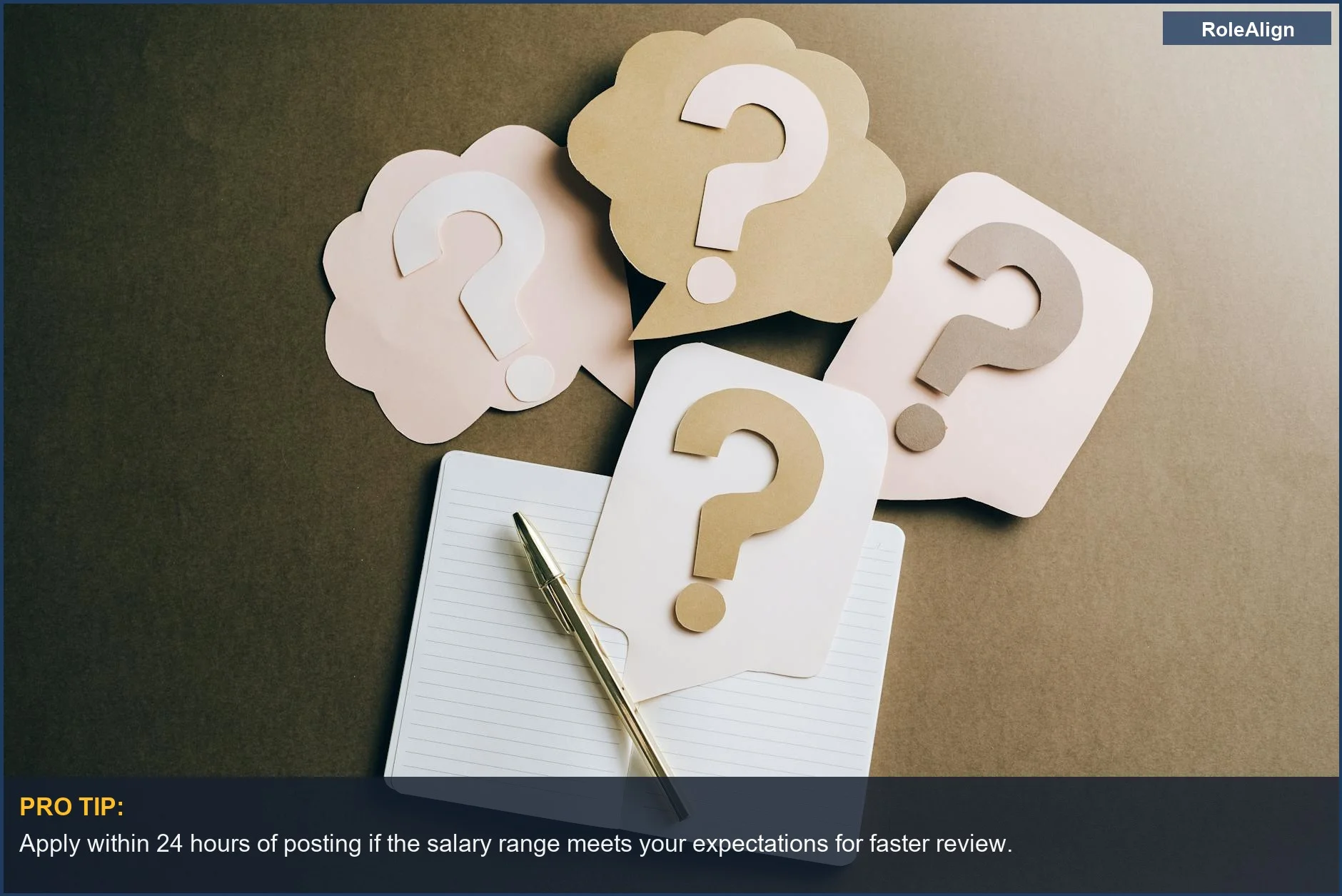 Question mark paper crafts on a notebook, representing the confusion around salary range job postings.