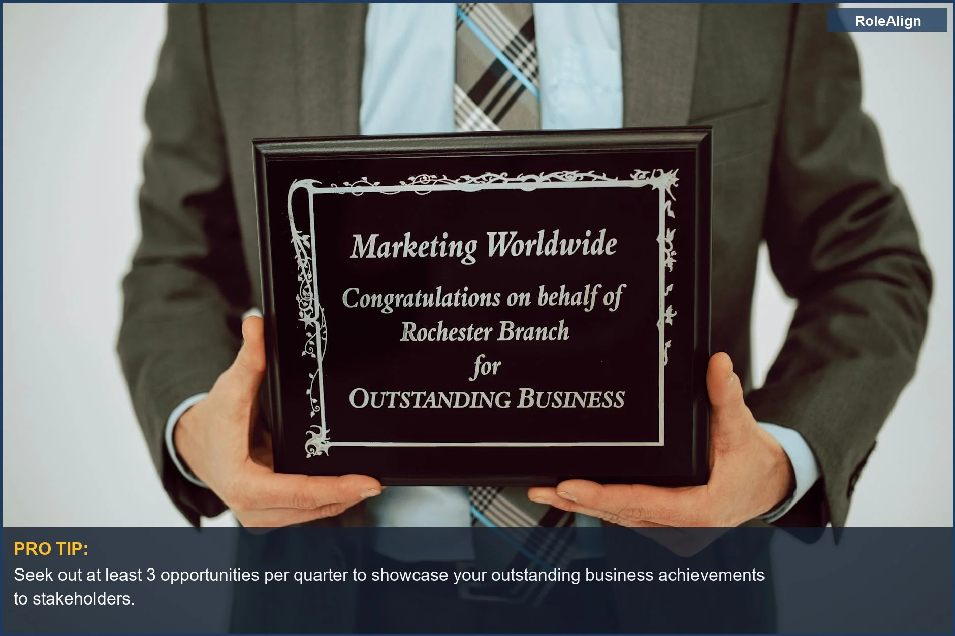 Businessperson proudly holding an award for achievement, showcasing that visible results are key to promotion.