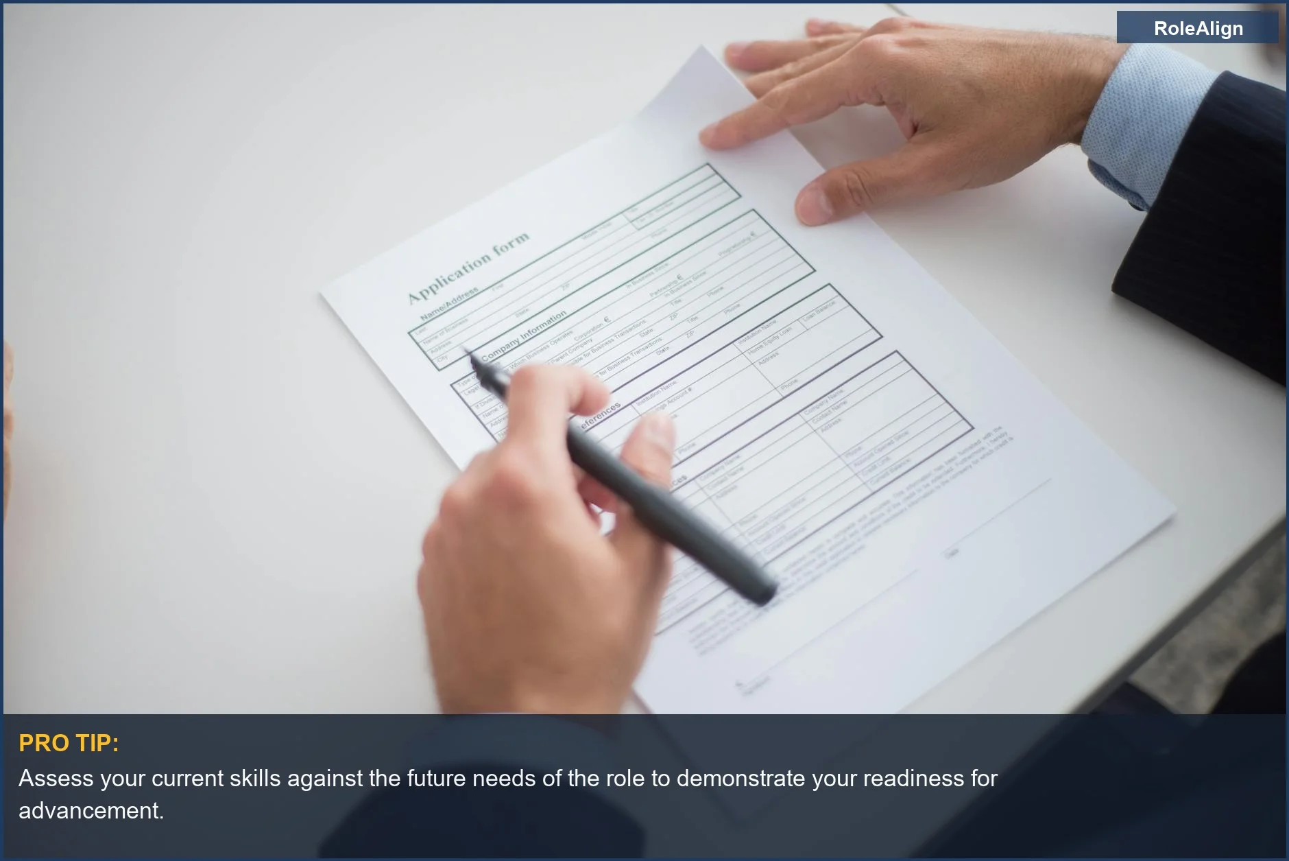 Business professional meticulously reviews job application, highlighting the importance of filling future organizational needs for internal promotion.