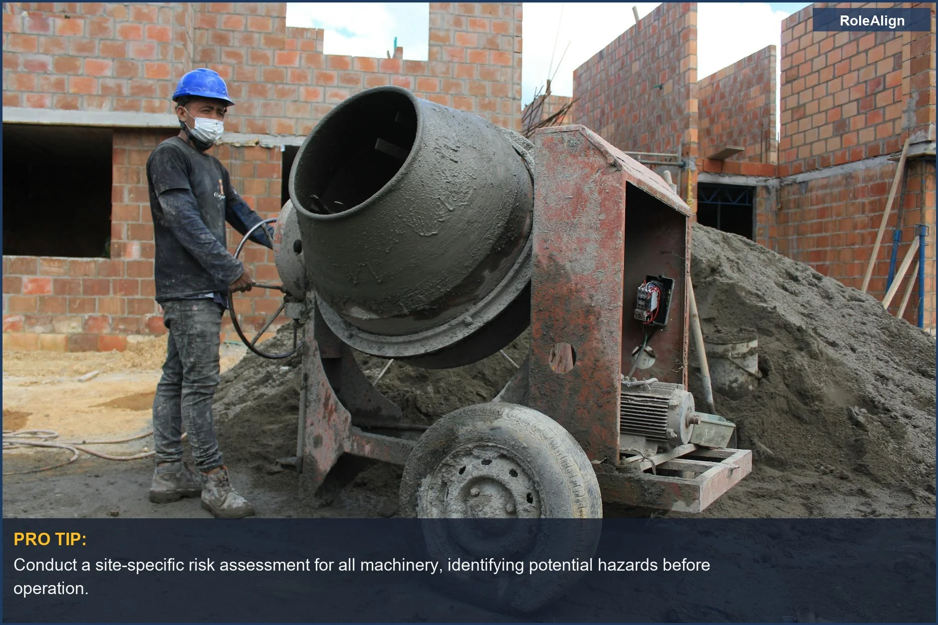 Construction worker operating a cement mixer on a building site, illustrating the practical application of WHS amendment risk assessments.